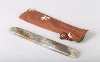A CHINESE ARCHAIC JADE HAND TOOL