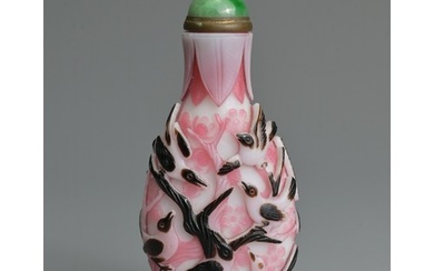 A CHINESE BLACK OVERLAY PINK AND WHITE SNUFF BOTTLE, QING DY...