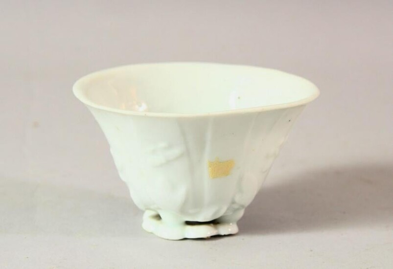 A CHINESE BLANC DE CHINE PORCELAIN LIBATION CUP, with