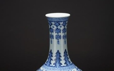 A CHINESE BLUE AND WHITE 'DRAGON THROUGH FLOWERS' VASE