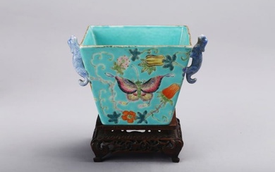 A CHINESE FAMILLE ROSE 'BUTTERFLIES AND MELONS' BOWL