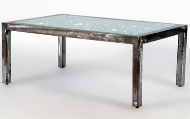 A CUT STEEL SWIRL FORM GLASS AND IRON COFFEE TABLE