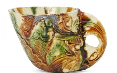 A Chinese sancai-glazed pottery rhyton, Tang dynasty, the body modelled...