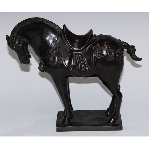 A Chinse dark-patinated equestrian bronze, of a Tang horse, ...