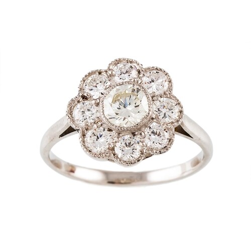 A DIAMOND CLUSTER RING, of 'Daisy Cluster' design, the circu...
