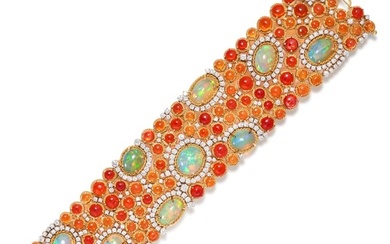 A FINE OPAL, FIRE OPAL AND DIAMOND BRACELET in 18ct yellow and white gold, the bracelet set
