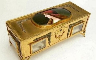 A FRENCH GILT AND ENAMEL JEWELRY BOX