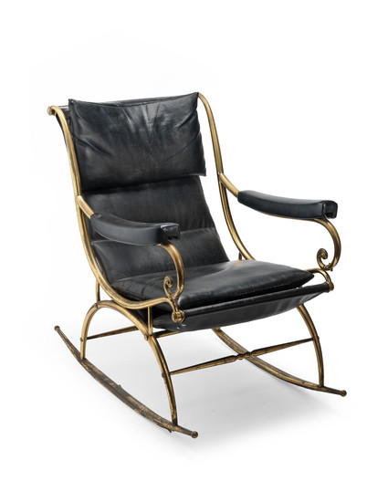 A French early 20th century gilt brass and black simulated leather upholstered rocking chair