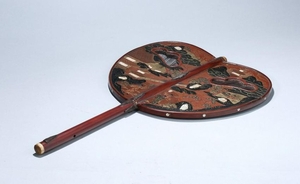 A LACQUERED WOOD FAN.QING PERIOD