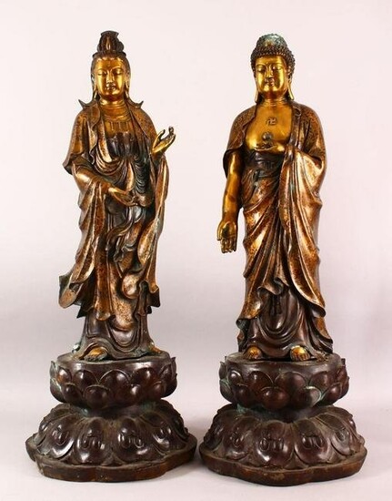 A LARGE PAIR OF CHINESE GILT BRONZE FIGURES OF DEITYS