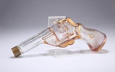 A LATE 19TH CENTURY GLASS NOVELTY SPIRIT FLASK, in the