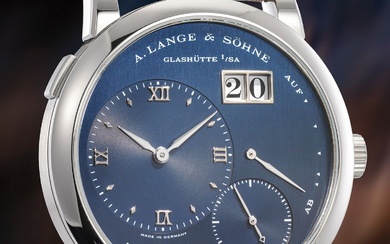 A. Lange & Söhne, Ref. 101.026 X A scholarship changing stainless steel wristwatch with small seconds, oversized date, power reserve indication, deep blue dial, guarantee, presentation box, the only one known in this combination