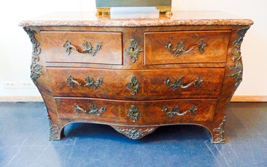 A Louis XV style chest of drawers opening with four...