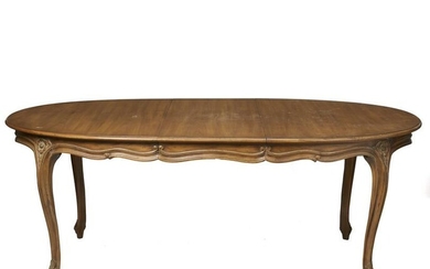 A Louis XV-style dining room table