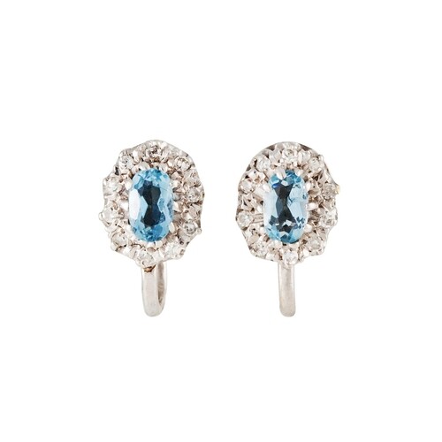 A PAIR OF DIAMOND AND AQUAMARINE CLUSTER EARRINGS, mounted i...