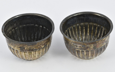 A PAIR OF LATE VICTORIAN STERLING SILVER SALT CELLARS