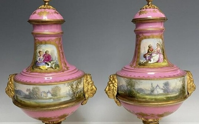 A PAIR OF ORMOLU MOUNTED SEVRES PORCELAIN VASES