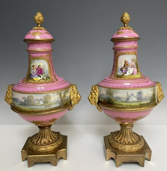 A PAIR OF ORMOLU MOUNTED SEVRES PORCELAIN VASES