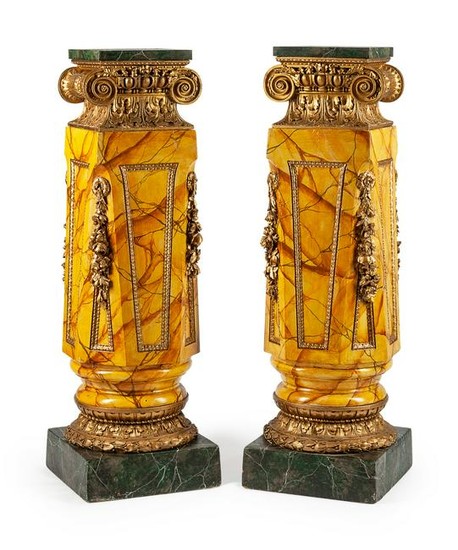 A Pair of Italian Giltwood and Faux Marble Pedestals