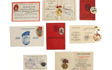 A RUSSIAN SOVIET BADGES WITH ORIGINAL DOCUMENTS