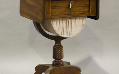 A Regency mahogany drop-flap work table, the reeded top above a writing drawer, a compartmentalized