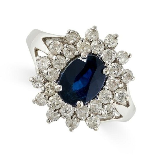 A SAPPHIRE AND DIAMOND CLUSTER RING Oval-cut sapphire