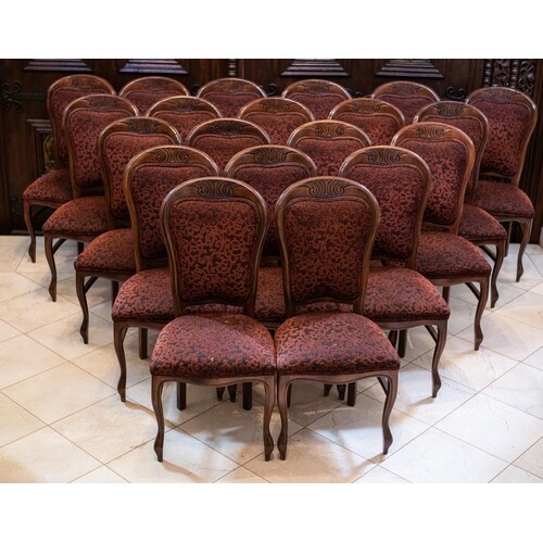 A SET OF 20 MAHOGANY AND UPHOLSTERED DINING CHAIRS Each cov...