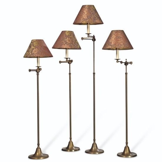 A SET OF FOUR FRENCH TELESCOPIC EXTENDABLE BRASS FLOOR LAMPS