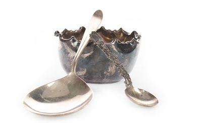 A SILVER BOWL ALONG WITH TWO SPOONS