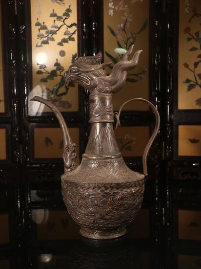 A SILVER CASTED PHOENIX SHAPED POT