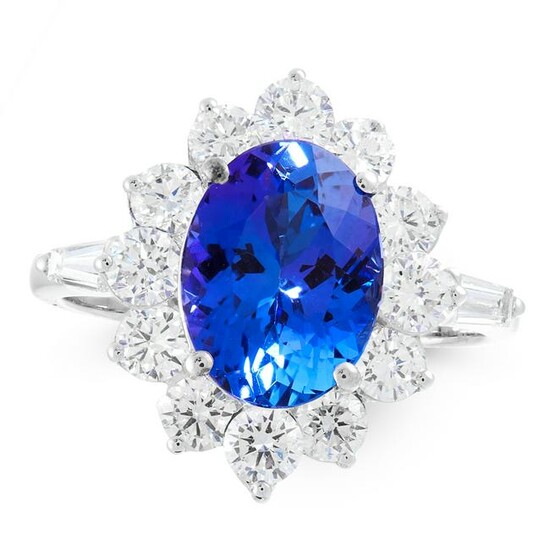 A TANZANITE AND DIAMOND DRESS RING in 18ct white gold