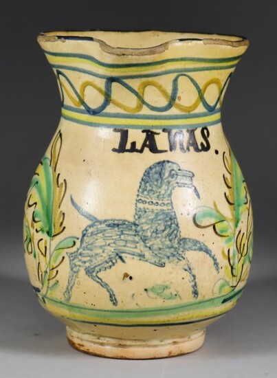 A Talavera Pottery Jug, 18th Century, painted with a...