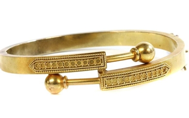 A Victorian gold, Archaeological Revival, Etruscan-style crossover hinged bangle, c.1870