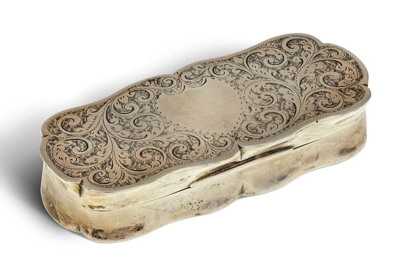 A Victorian silver snuff box, Birmingham, 1896, John Gilbert, of shaped oval form, the base and lid decorated with foliate scroll chasing, vacant cartouche to lid, 3.8 x 9.1cm, approx. weight 3.7oz