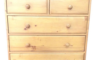 A Victorian style pine chest of drawers, the moulded...