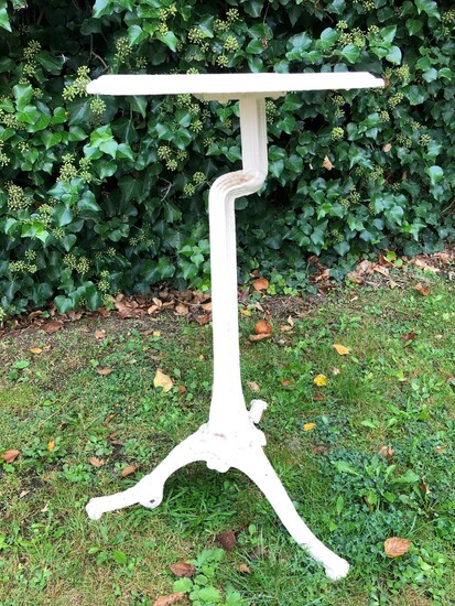 A Victorian white painted cast iron tripod table