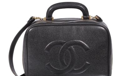 A black leather bag with strap, Chanel vanity the...
