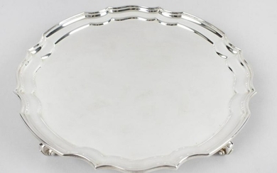 A cased modern silver salver, of circular form with pie