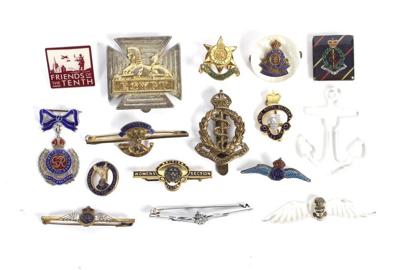 A collection of sixteen assorted military cap and sweetheart brooches. Including RAF, army ordnance corps, Jellalabad , Burma star, RAF lucite, Royal engineers silver sweetheart brooch, etc.