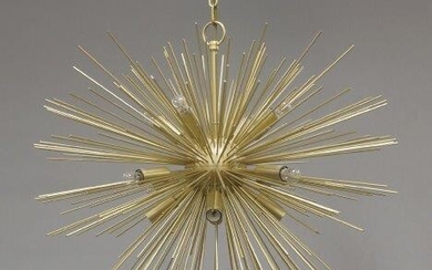 A contemporary brass starburst ceiling light, of recent manufacture, comprising different length brass rods emanating from a central domed brass case, 92cm high It is the buyer's responsibility to ensure that electrical items are professionally...
