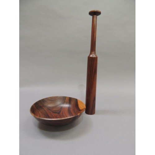A coromandel wood turned bowl on foot rim, 21.5cm x 7cm high...