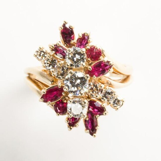 A diamond, ruby and fourteen karat gold ring