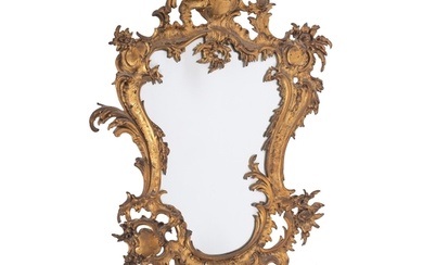 A gilt metal framed wall mirror in Rococo style, second half...
