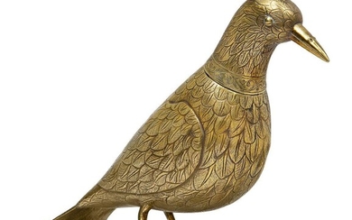 A gilt metal vessel modelled as a bird, realistically chased with feathers and raised on two textured claw feet, the head designed as a removable cap to hollow body, 15cm high, 20cm long
