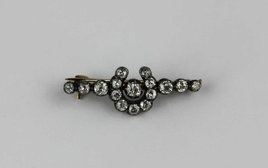A gold backed and silver set diamond brooch