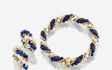 A lapis lazuli, cultured pearl, and eighteen karat gold