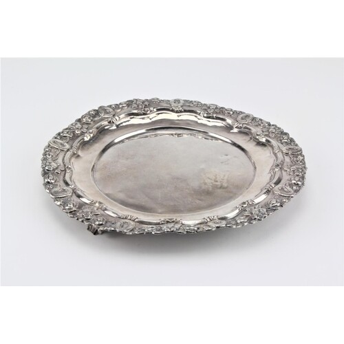 A late 19th Century silver coloured white metal tray, decora...
