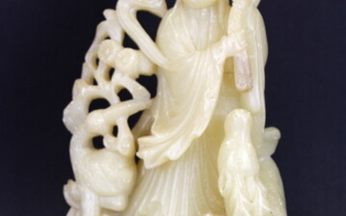 A lovely 19th Century Chinese carved soapstone figure of a female deity with a deer and a crane, H. 36cm.