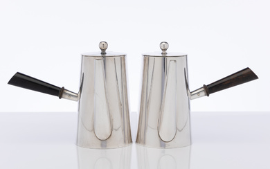 A matching pair of Art Deco silverplate hot chocolate pots...