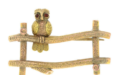 A mid 20th century 9ct gold bi-colour brooch, designed to depict an owl standing on a gate, by Cropp & Farr.